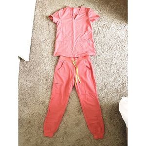Used Figs brand scrub set size XS in color Coral.